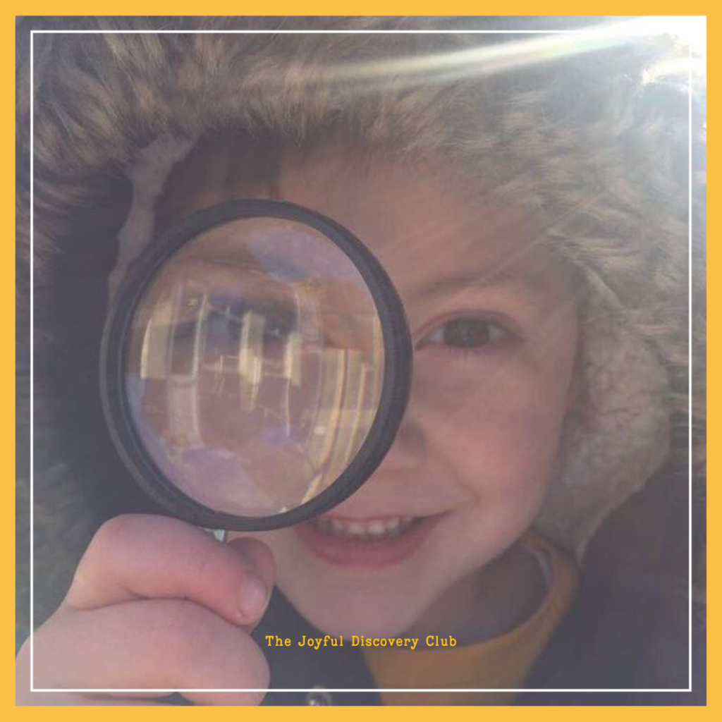 Joyful Discovery - Boy with magnifying glass